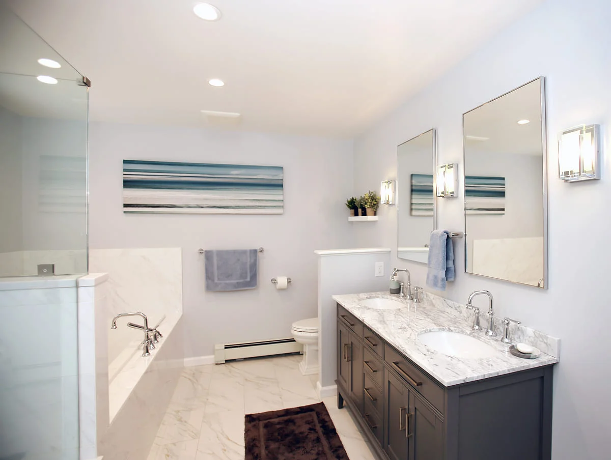 Double vanity and tubshower combo in Islip, NY bathroom remodel by Kuhn Construction