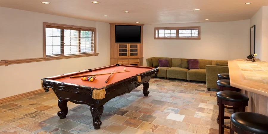 Finished basement in Islip, NY by Kuhn Construction with pool table and bar