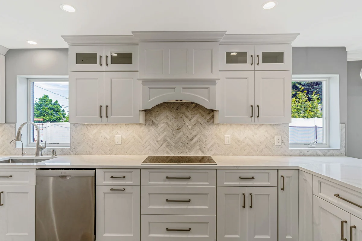 Fabuwood shaker-style cabinets in kitchen remodel by Kuhn Construction