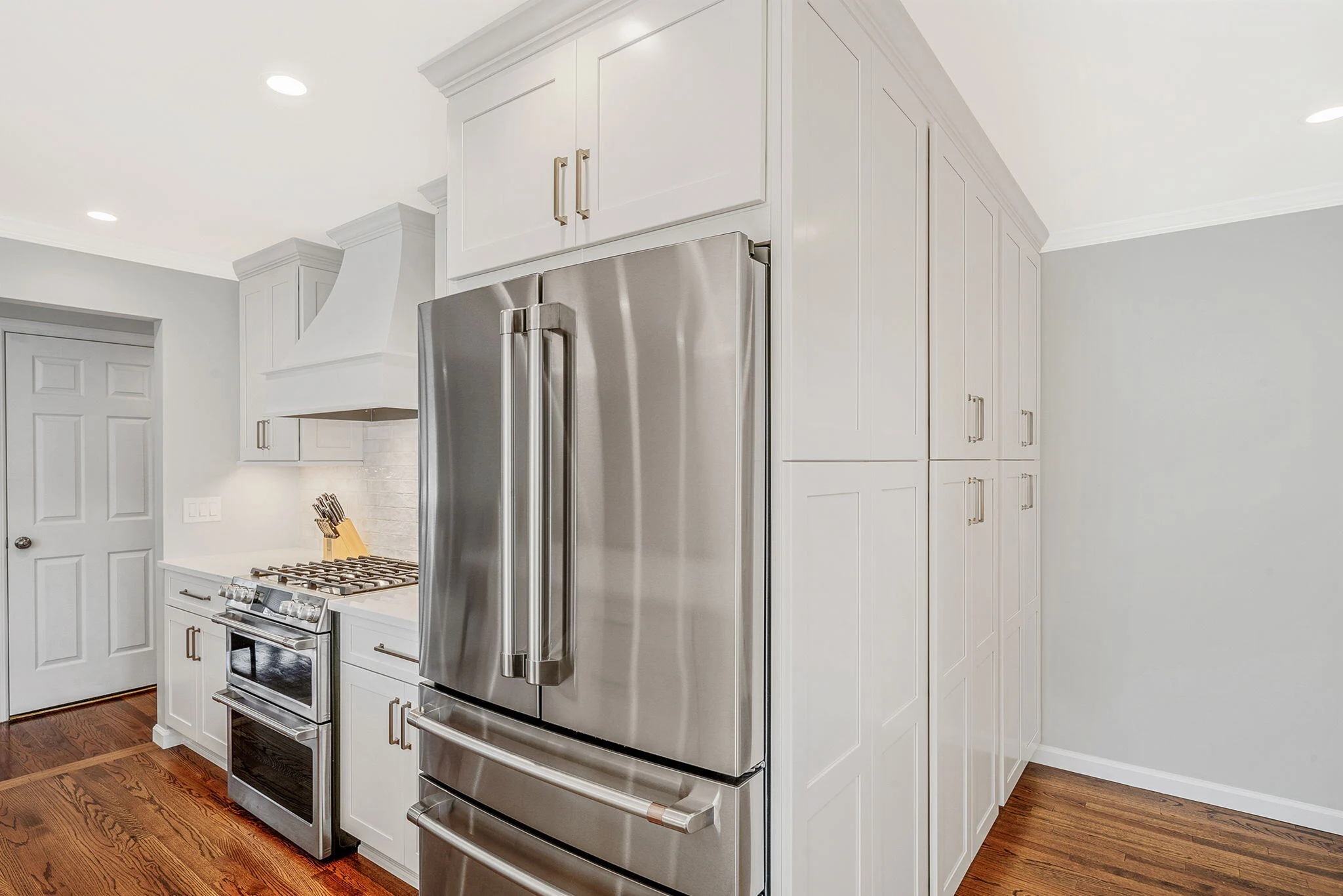 Kitchen remodel with stainless steel appliances by Kuhn Construction in Hicksville, NY